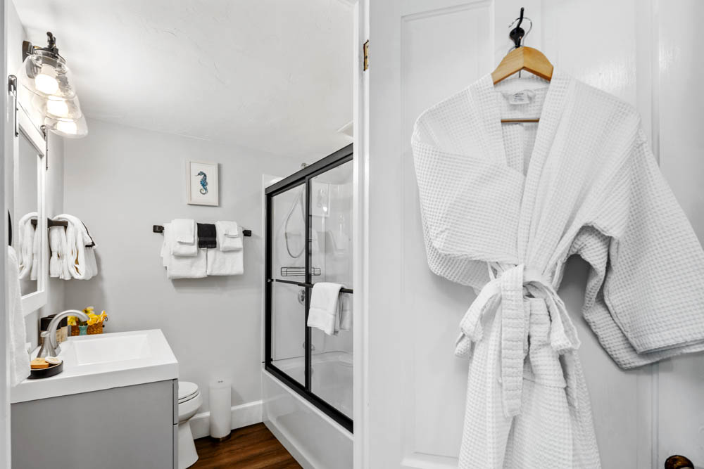 bathroom with robes